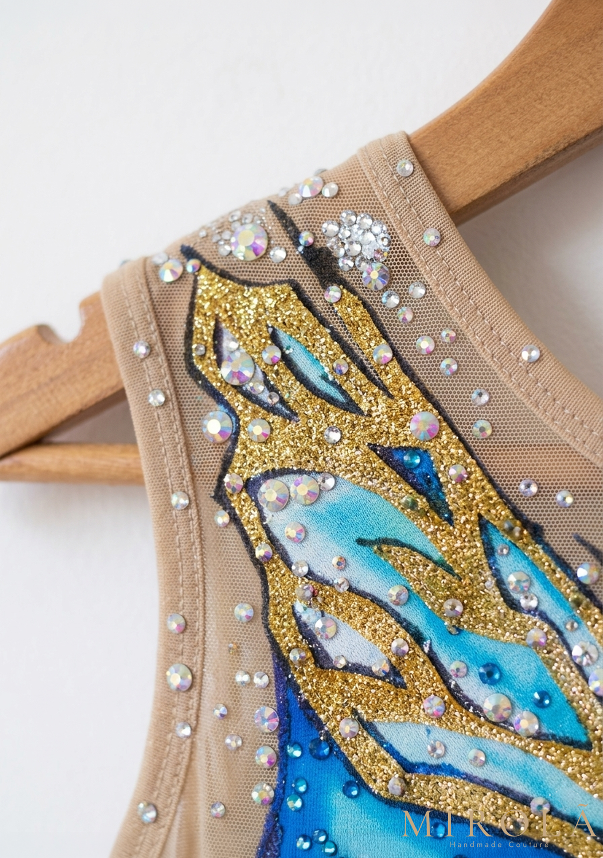 Aurora rhythmic gymnastics competition leotard — shoulder and wing detail