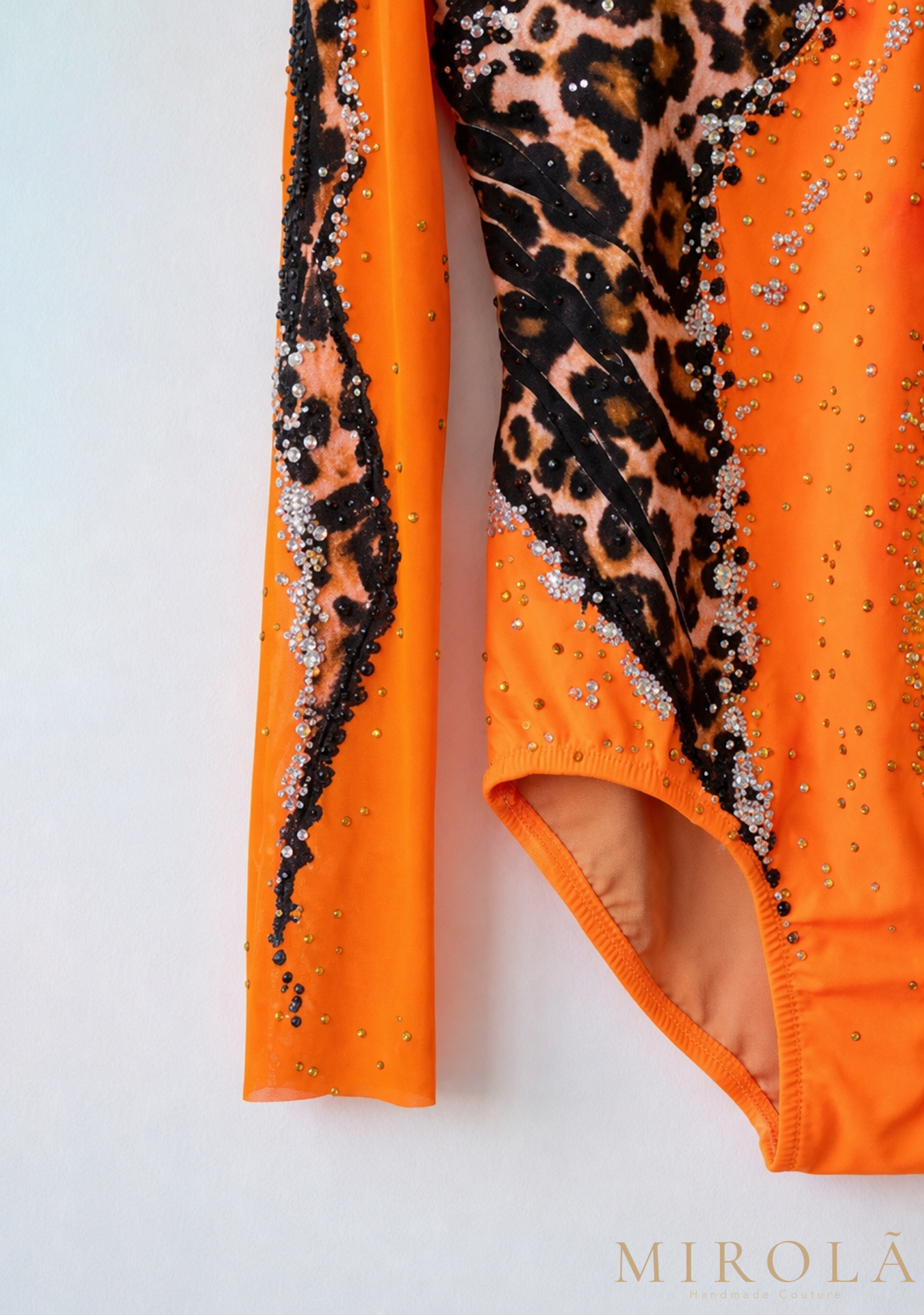 Amber rhythmic gymnastics competition leotard — sleeve and leg detail