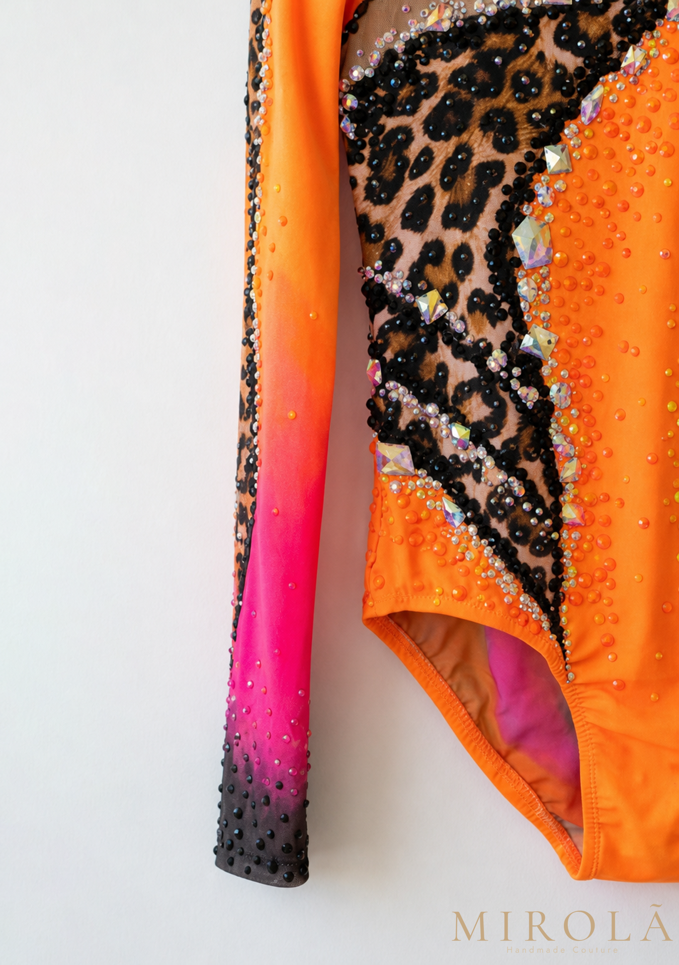 Coral rhythmic gymnastics competition leotard — ombré sleeve detail