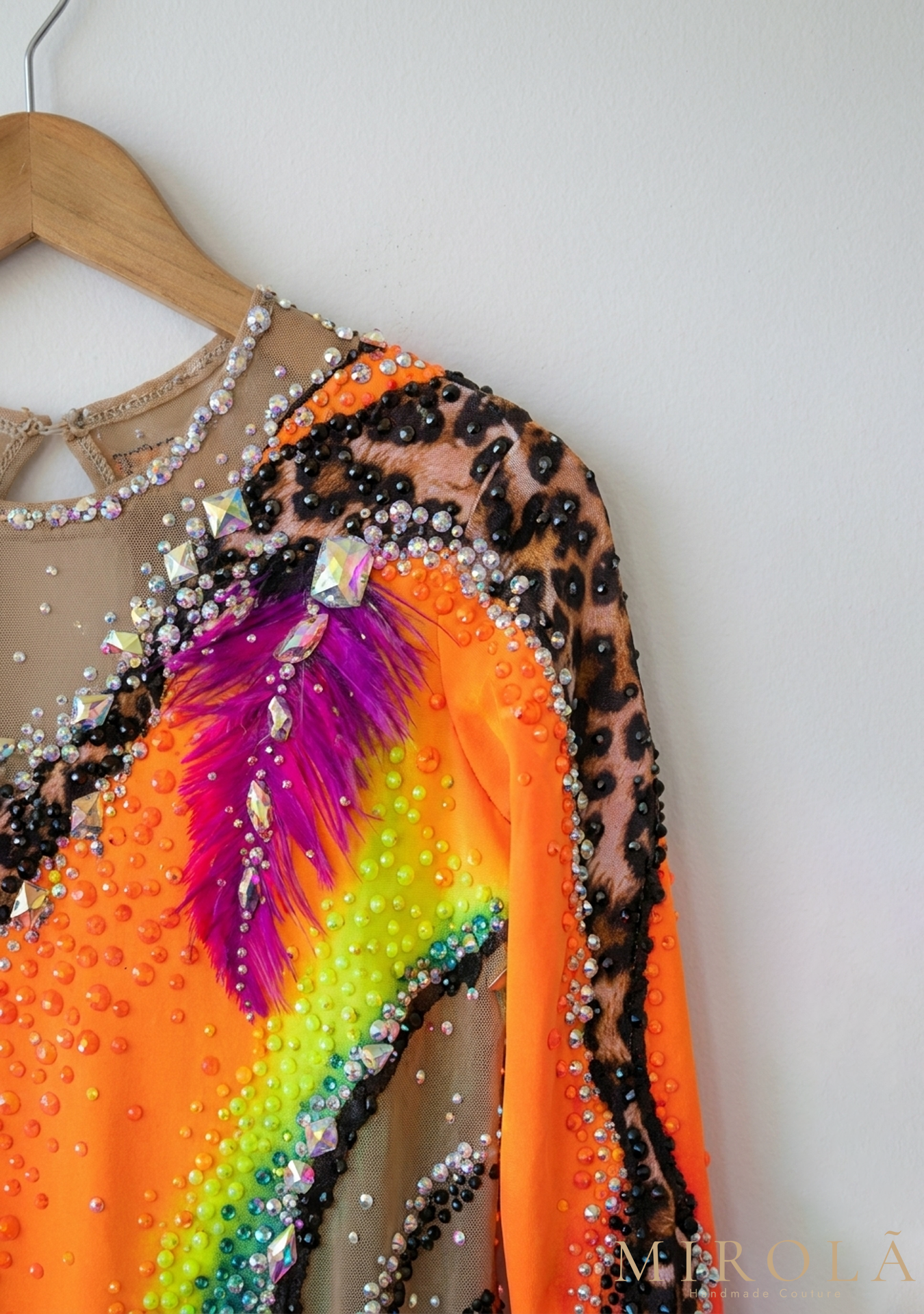 Coral rhythmic gymnastics competition leotard — shoulder detail