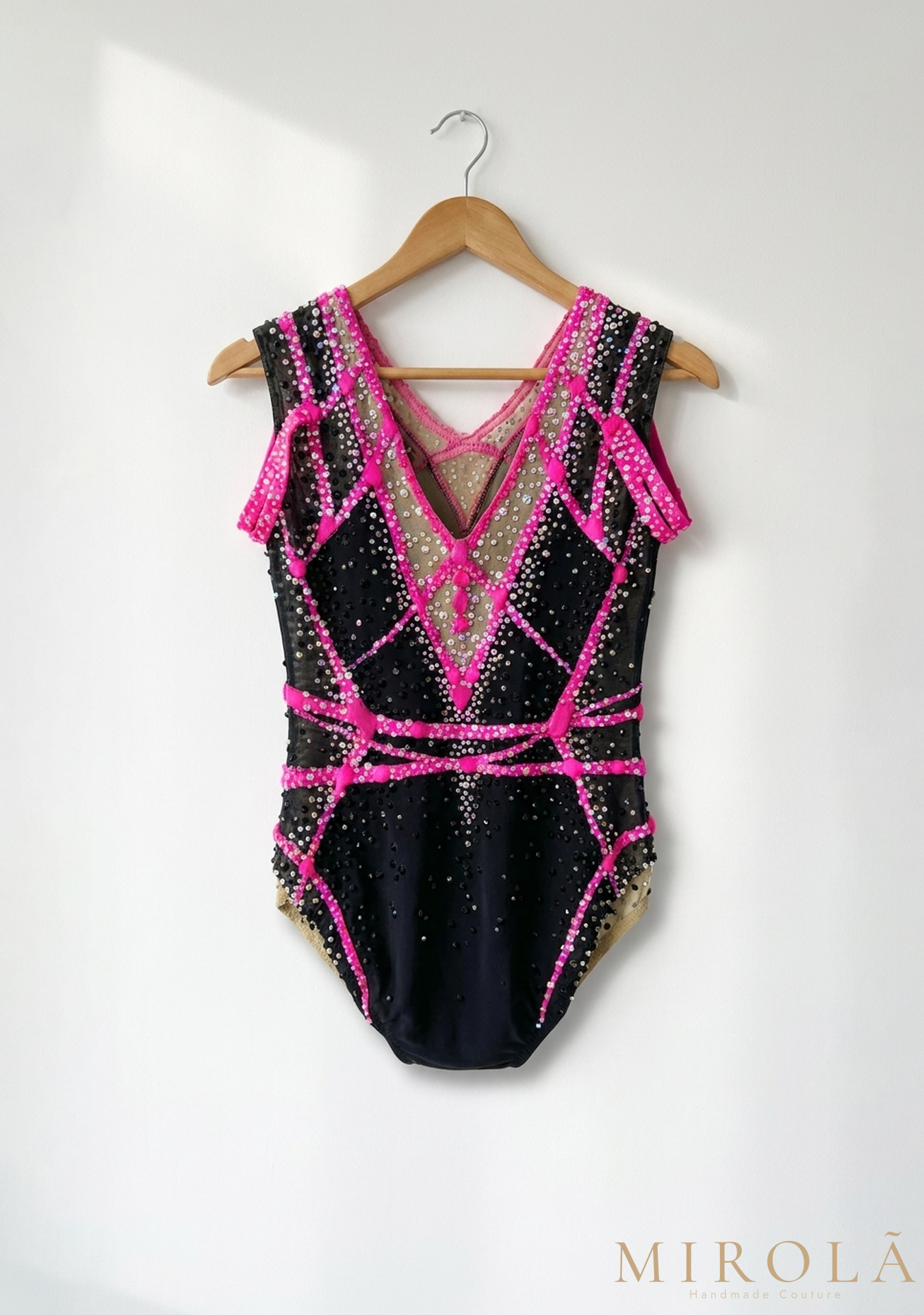 Fuchsia rhythmic gymnastics competition leotard — back view