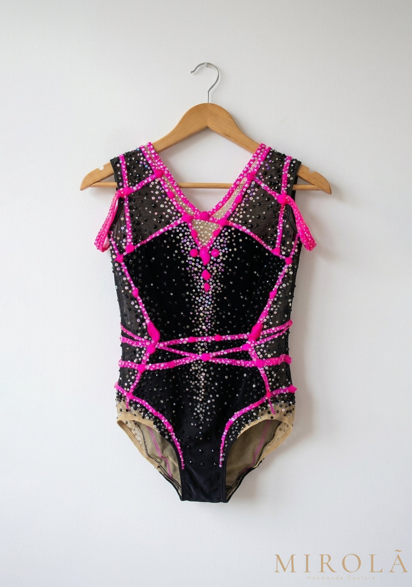 Fuchsia rhythmic gymnastics competition leotard — front view