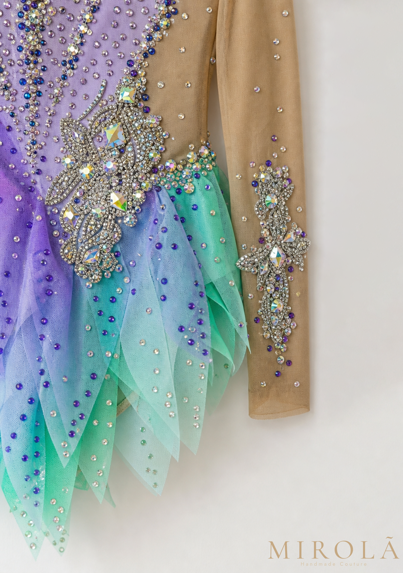 Lila rhythmic gymnastics competition leotard — brooch and sleeve detail
