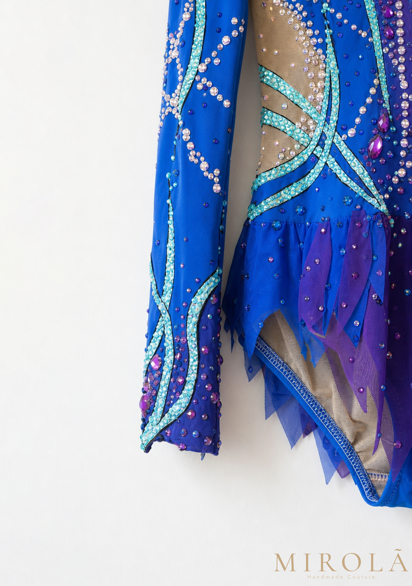Safir rhythmic gymnastics competition leotard — sleeve and hem detail
